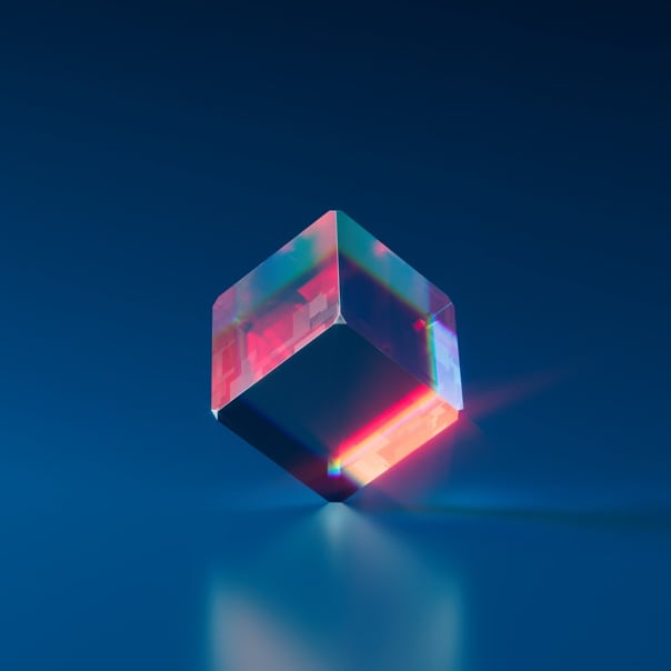 3D cube floating with a glowing reflection